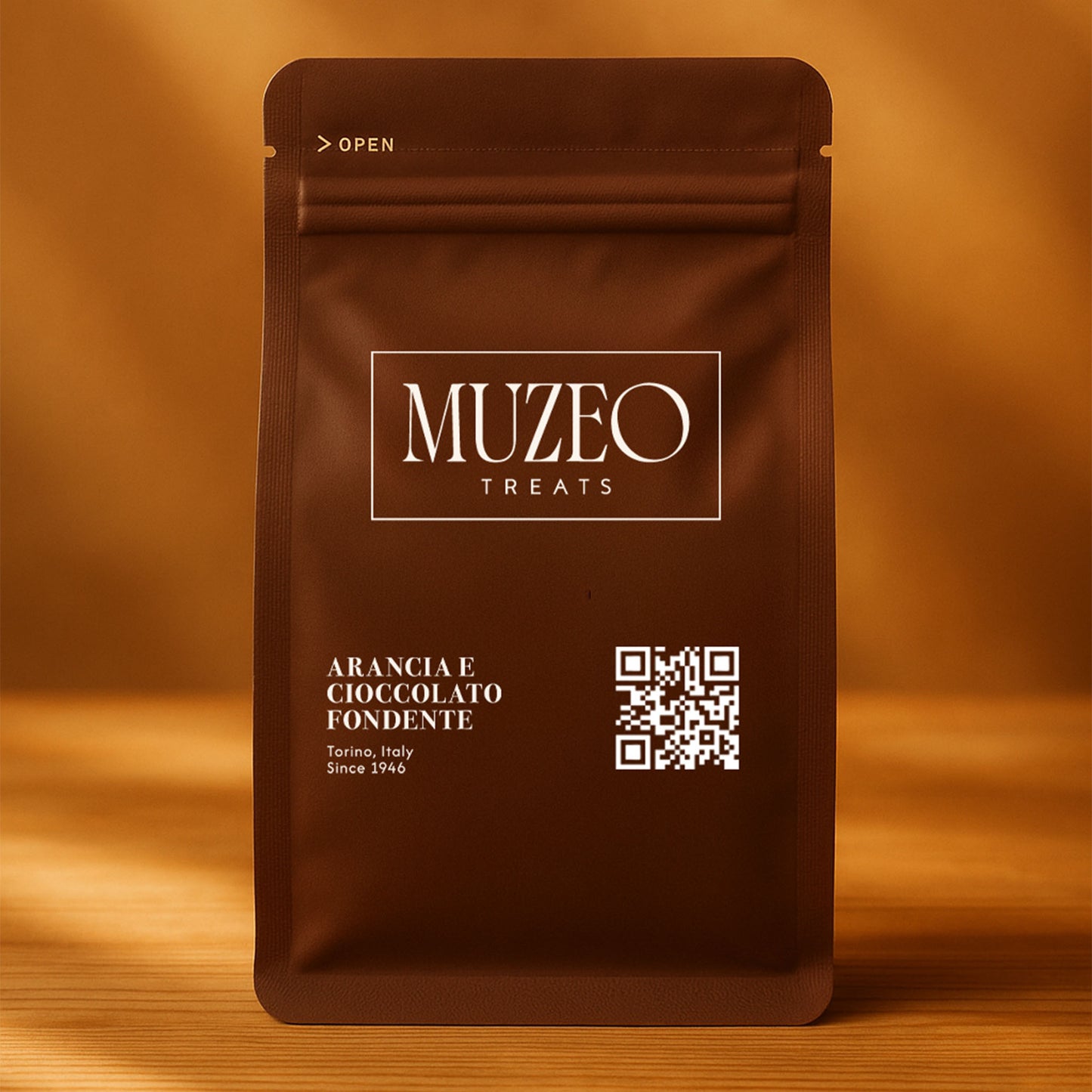 <div style="text-align: center;"> <span style="color: #1D1919;">Arancia e cioccolato fondente (3.5 oz.)</span><br><span style="color: #444444;">Torino, Italy </span> <br> <span style="color: #444444;">Pouch Dims. 6.0" × 3.5" × 2.15"</span> </div>