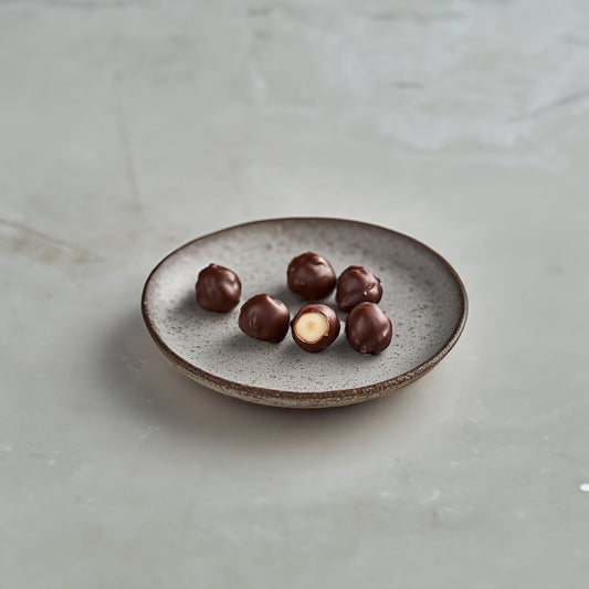 <div style="text-align: center;"> <span style="color: #1D1919;"> Nocciola e cioccolato fondente (3.5 oz.)</span><br><span style="color: #444444;">Torino, Italy</span> <br> <span style="color: #444444;">Since 1946</span> </div> 