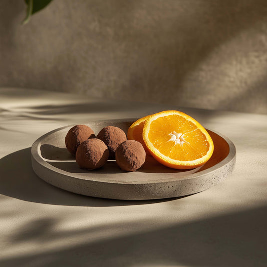 <div style="text-align: center;"> <span style="color: #1D1919;"> Truffes aux Ecorces d'Orange confites (4 oz.)</span><br><span style="color: #444444;">Andilly, France</span> <br> <span style="color: #444444;">Since 1931</span> </div> 