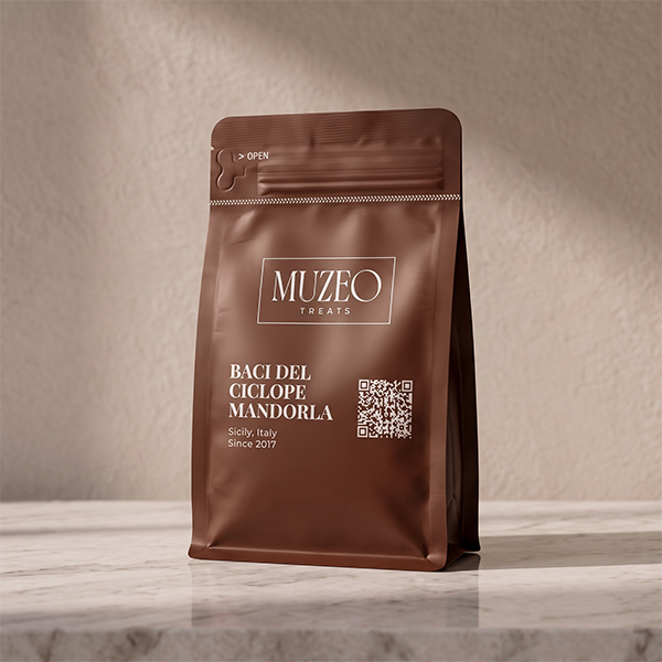<div style="text-align: center;"> <span style="color: #1D1919;">Baci del Ciclope Mandorla (3.5 oz.)</span><br><span style="color: #444444;">Sicily, Italy</span> <br> <span style="color: #444444;">Pouch Dims. 6.0" × 3.5" × 2.15"</span> </div> 