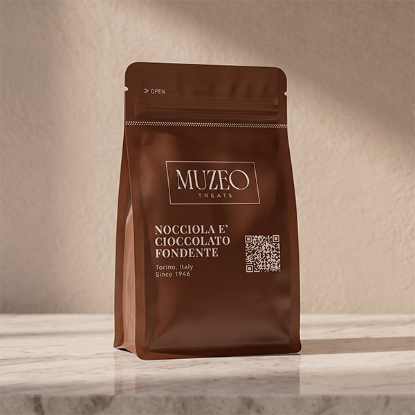 <div style="text-align: center;"> <span style="color: #1D1919;"> Nocciola e cioccolato fondente (3.5 oz.)</span><br><span style="color: #444444;">Torino, Italy </span> <br> <span style="color: #444444;">Pouch Dims. 6.0" × 3.5" × 2.15"</span> </div> 