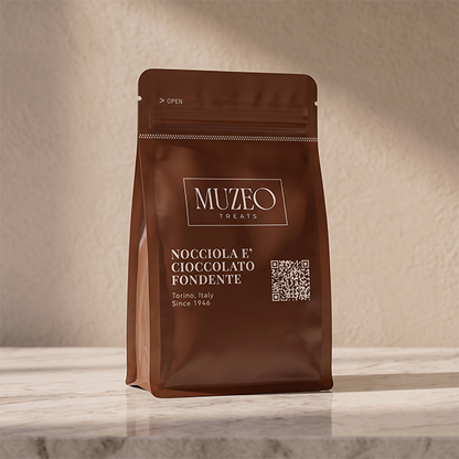<div style="text-align: center;"> <span style="color: #1D1919;"> Nocciola e cioccolato fondente (3.5 oz.)</span><br><span style="color: #444444;">Torino, Italy </span> <br> <span style="color: #444444;">Pouch Dims. 6.0" × 3.5" × 2.15"</span> </div> 