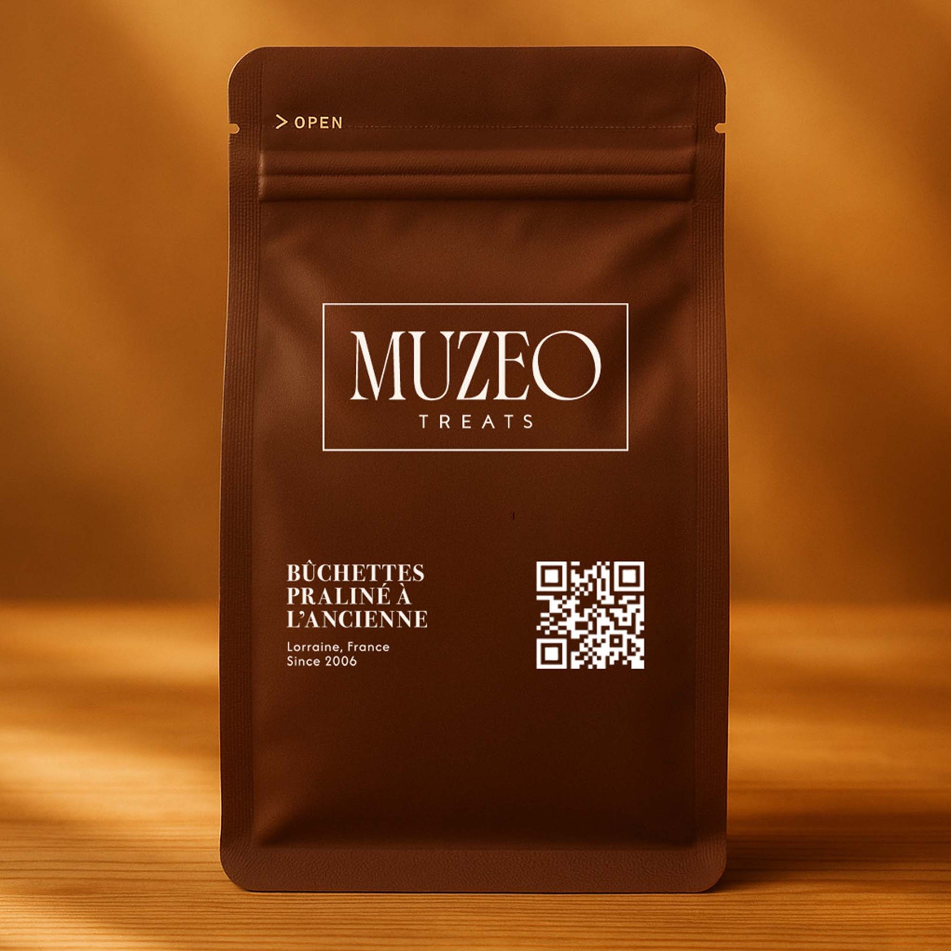 <div style="text-align: center;"> <span style="color: #1D1919;">Bûchettes Praliné à L’Ancienne (3 oz.)</span><br><span style="color: #444444;">Lorraine, France </span> <br> <span style="color: #444444;">Pouch Dims. Pouch Dims. 6.0" × 3.5" × 2.15"</span> </div> 