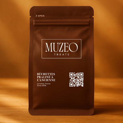<div style="text-align: center;"> <span style="color: #1D1919;">Bûchettes Praliné à L’Ancienne (3 oz.)</span><br><span style="color: #444444;">Lorraine, France </span> <br> <span style="color: #444444;">Pouch Dims. Pouch Dims. 6.0" × 3.5" × 2.15"</span> </div> 